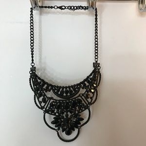 Black jewel bib necklace.